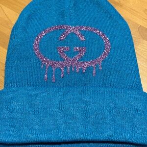 Blue Beanie with Dripping Pink Glitter Logo